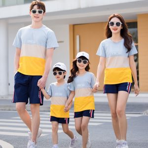Family wearing striped matching t-shirt and shorts summer outfits