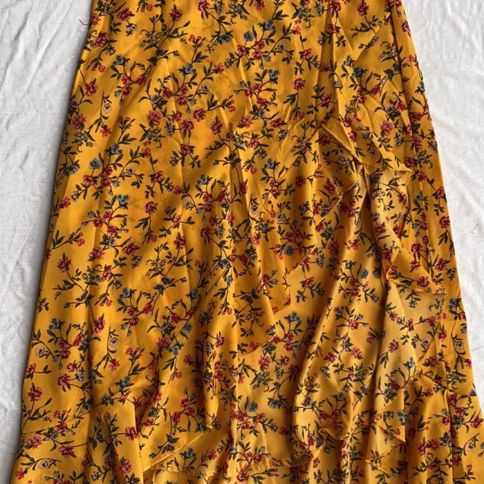 Printed ruffled maxi skirt with side slit design, lightweight and flowy summer skirt for women in casual boho style