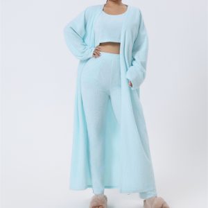 Women’s cozy 3-piece warm pajama lounge set with matching top, pants, and outerwear for winter sleepwear and stylish home loungewear.